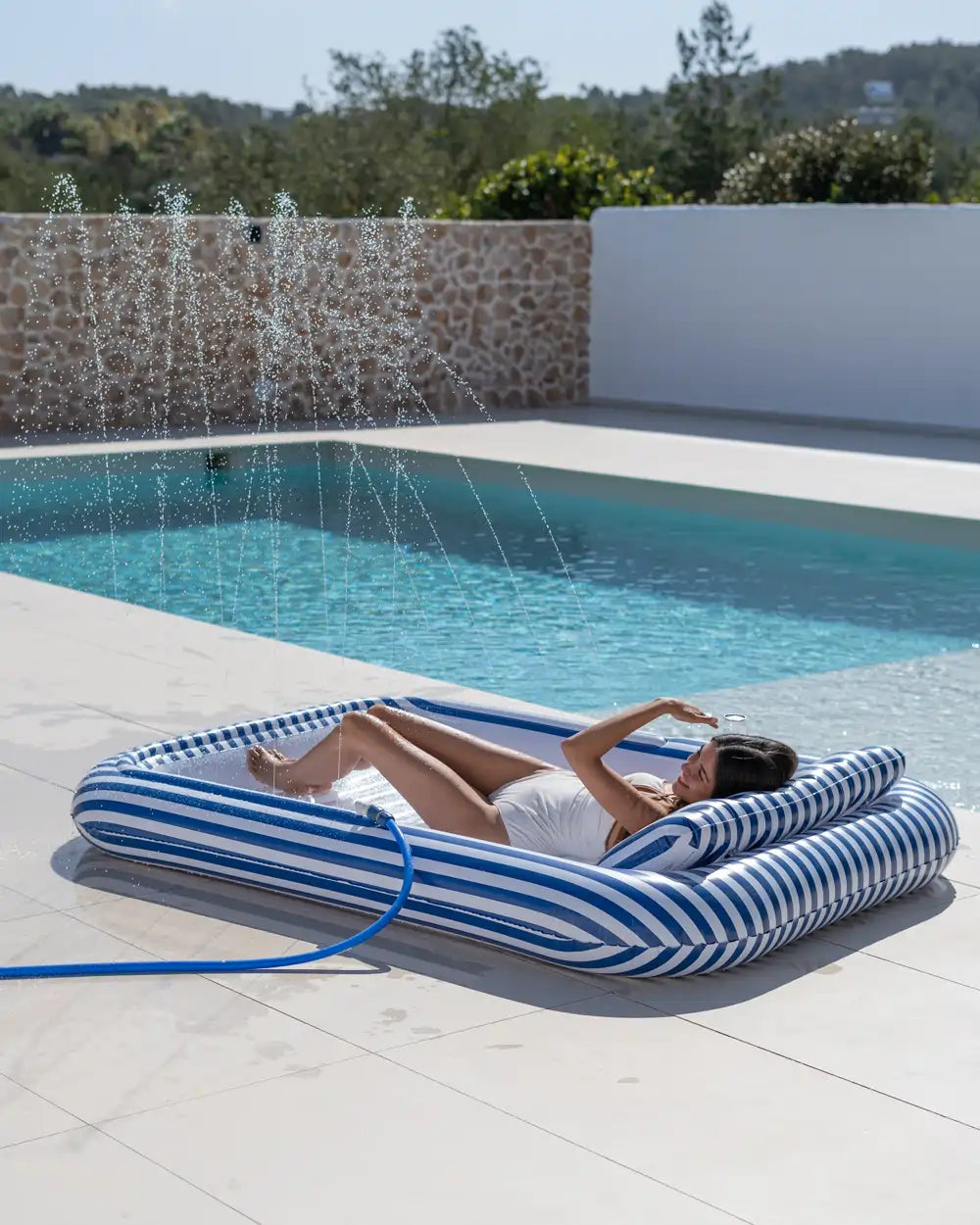Piscina inflable con aspersor – SACHA