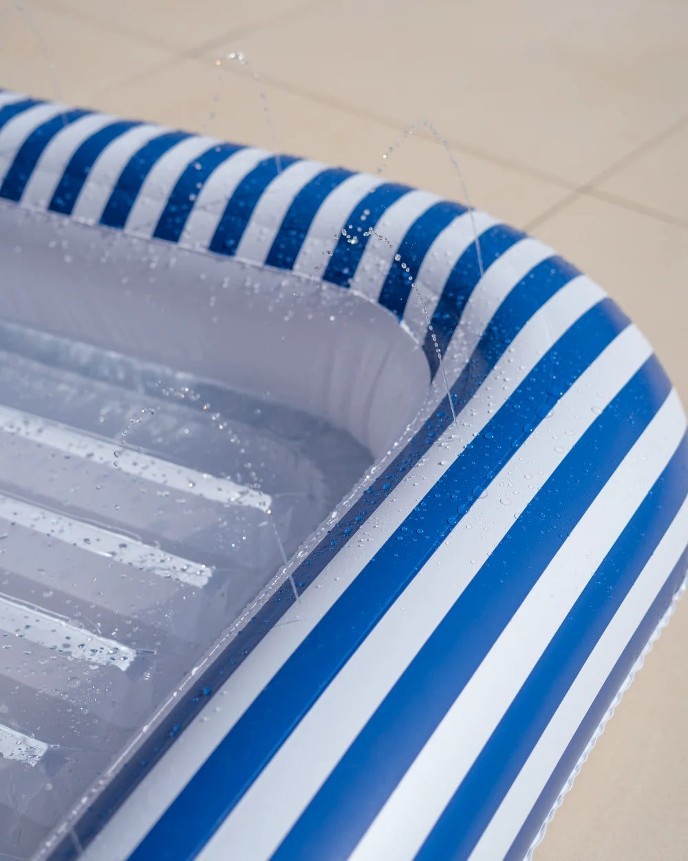 Piscina inflable con aspersor – SACHA